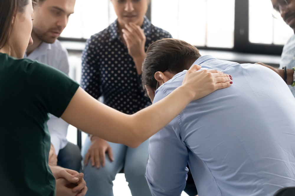 During,Group,Therapy,Session,Participants,Supporting,Crying,Desperate,Guy,,Provide